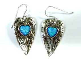 Sterling silver heart earrings set with blue opals.